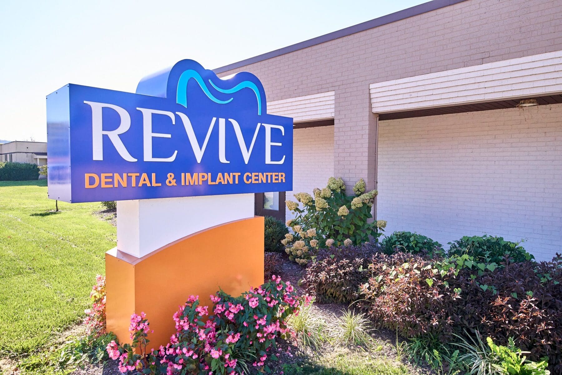 
                Revive Dental and Implant Center exterior signage